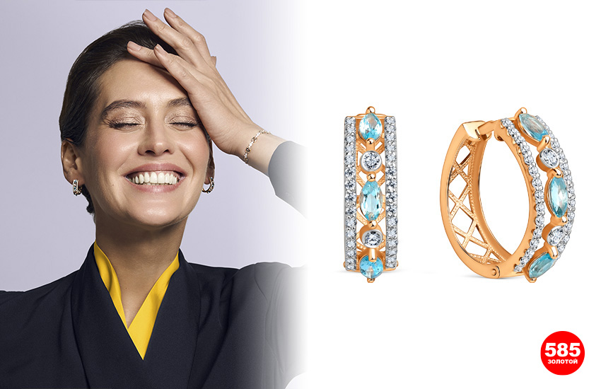 серьги с топазами, модные серьги, девушка улыбается